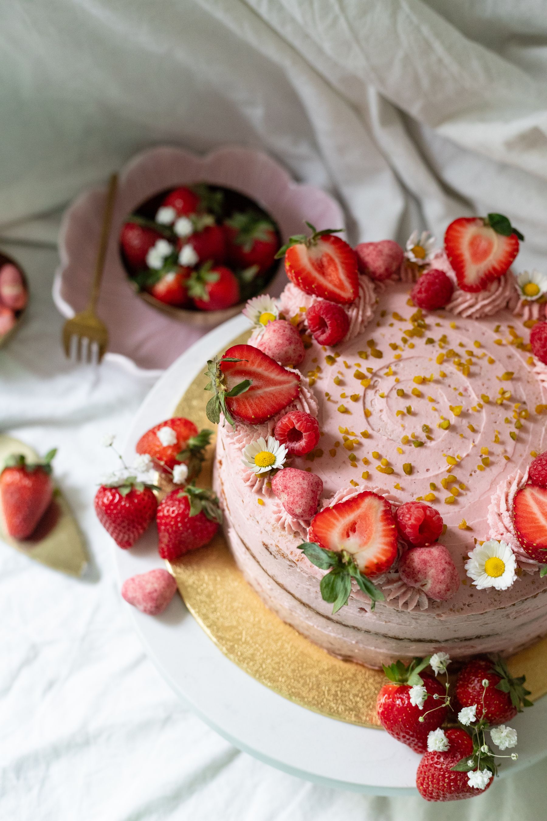 Strawberry layer cake with pink frosting