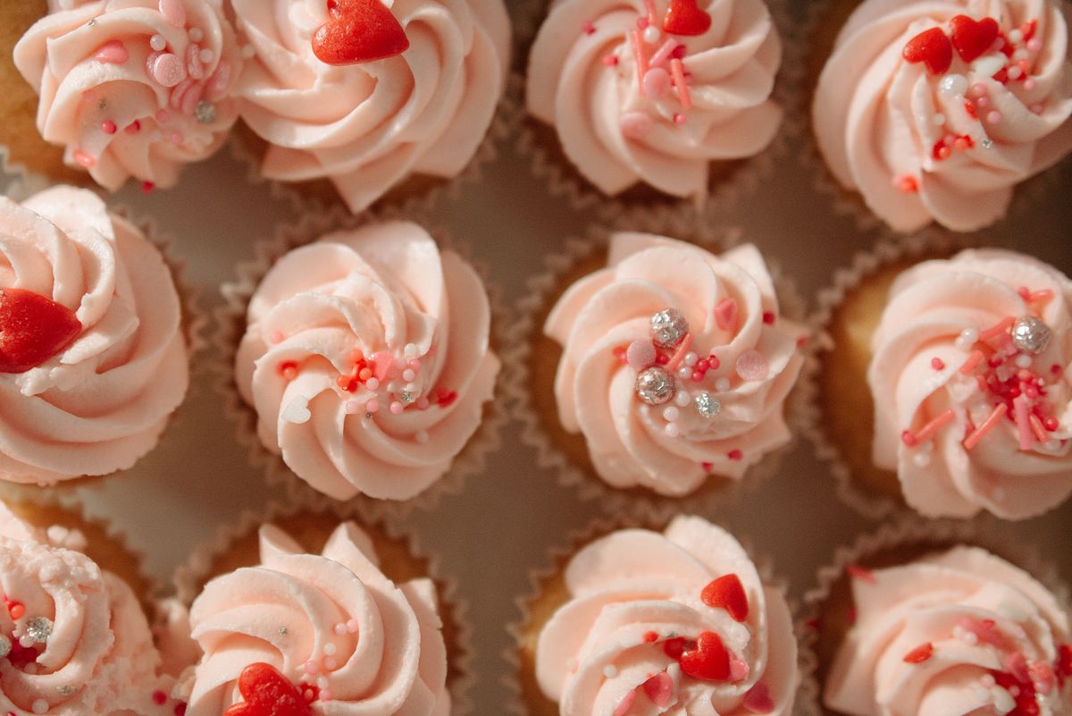 Delicate cupcakes with swirls of buttercream